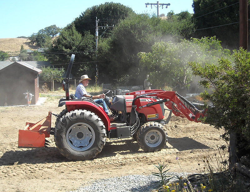 tractor working on new growing grounds